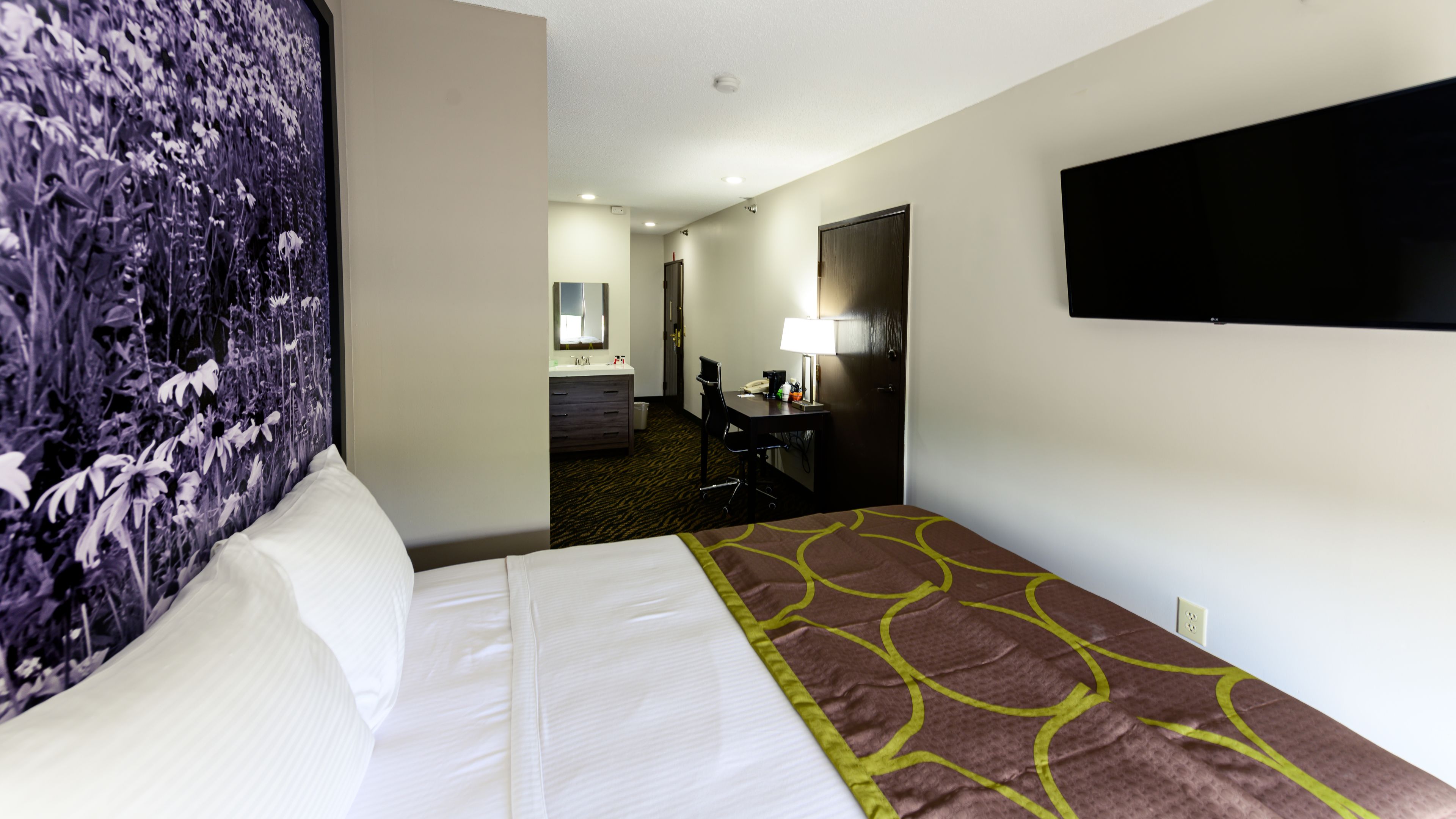 room, 1 queen bed, non smoking (cruise) | blackout curtains, iron/ironing board, free wifi, bed sheets