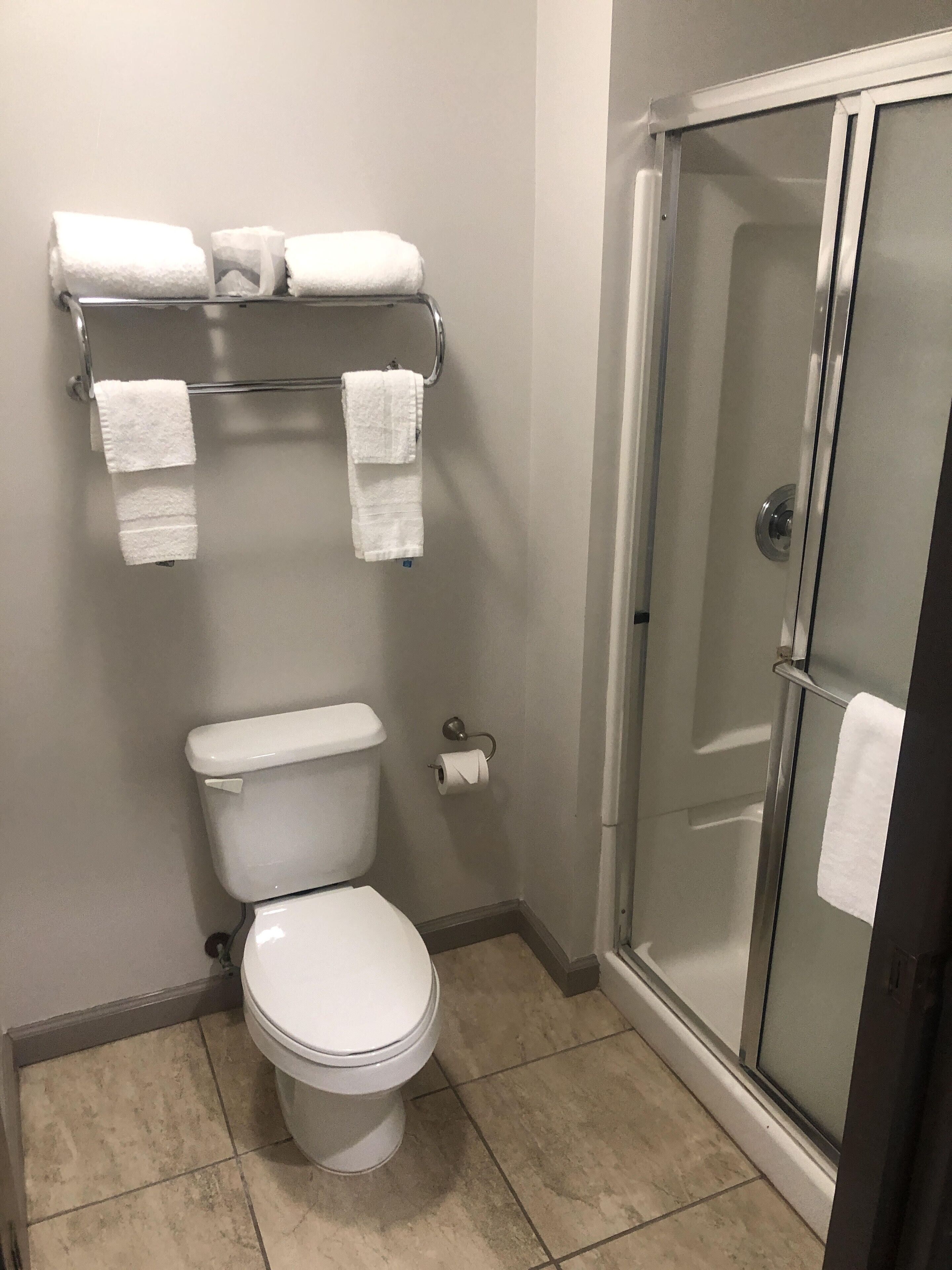 room, 1 queen bed, non smoking (cruise) | bathroom | combined shower/bathtub, free toiletries, hair dryer, towels