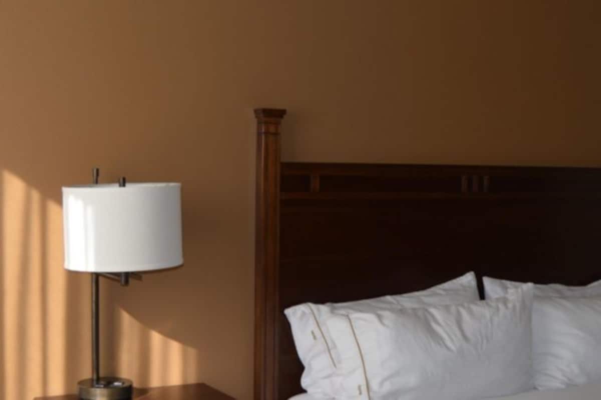 desk, blackout curtains, iron/ironing board, free cots/infant beds