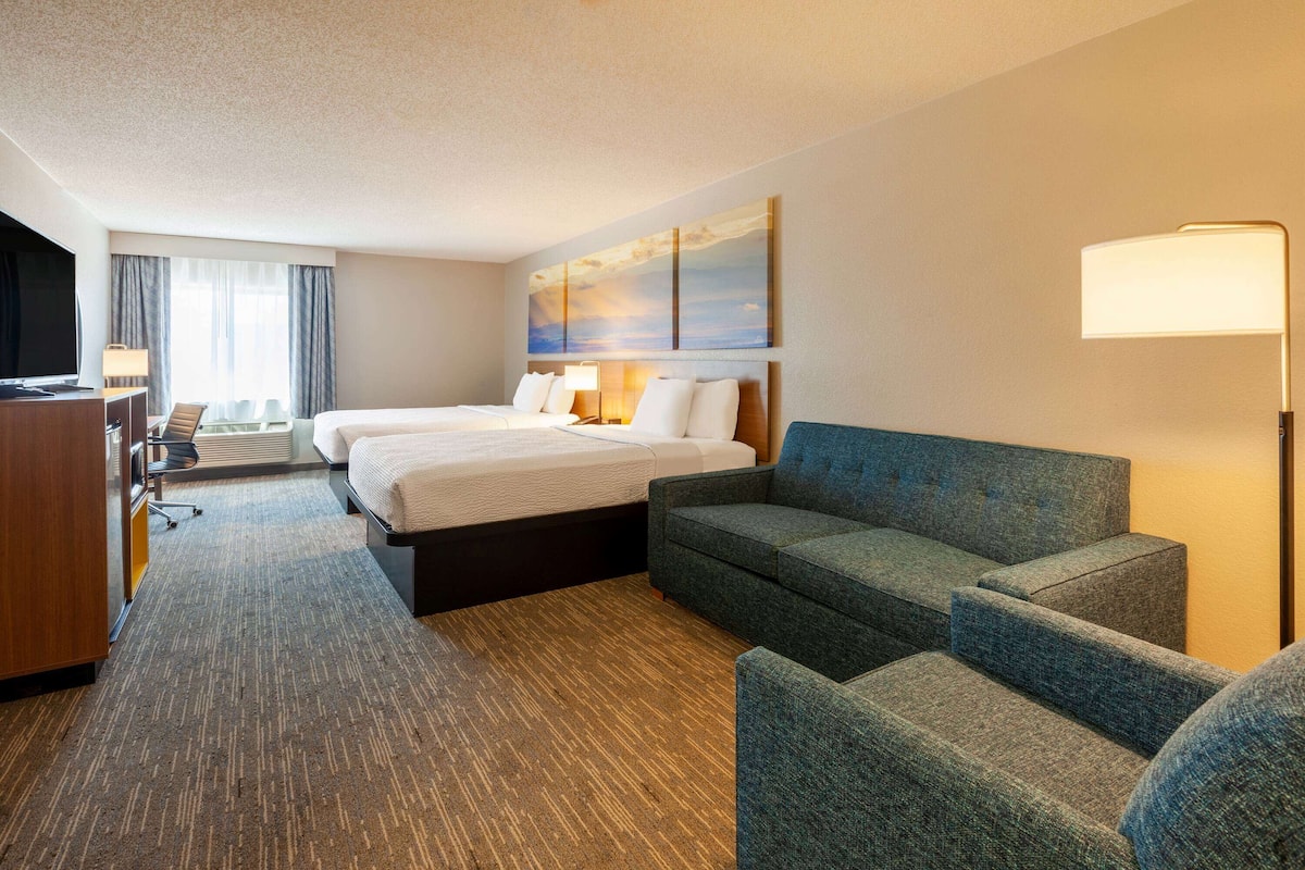 Suite, 2 Queen Beds, Non Smoking | Desk, soundproofing, iron/ironing board, free cribs/infant beds