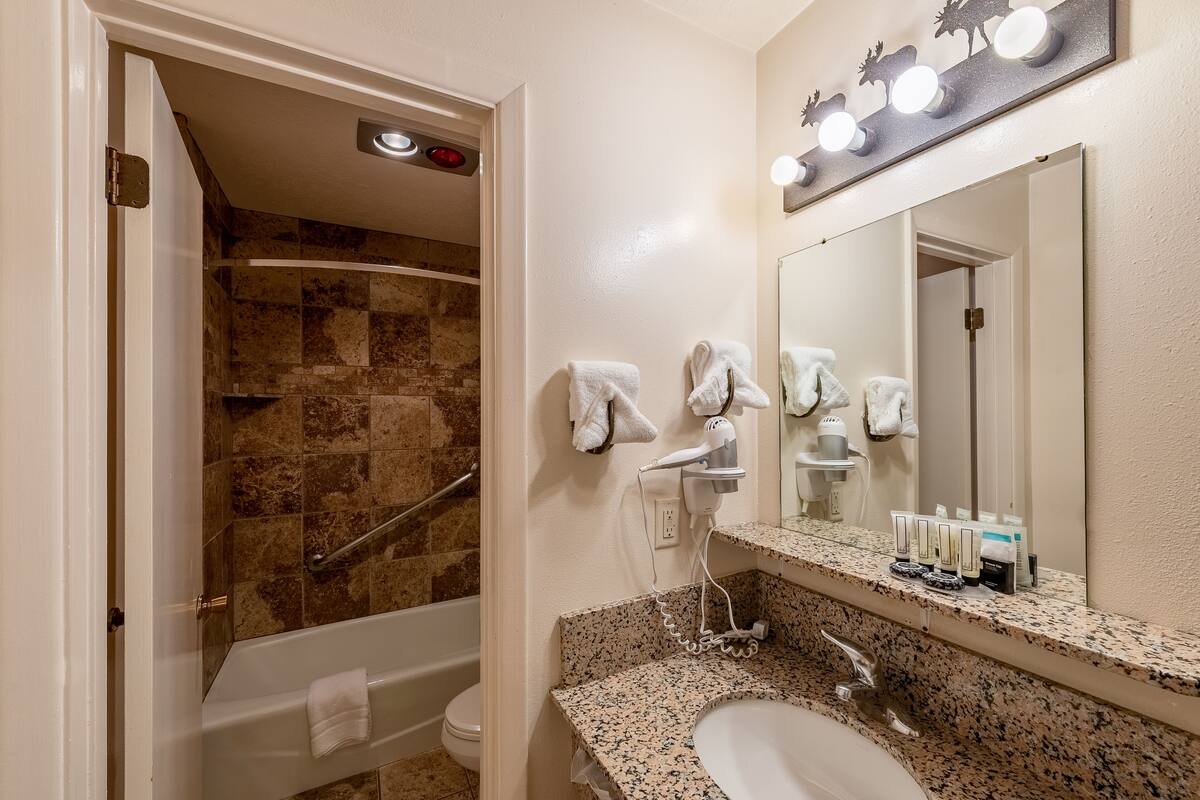 standard room, 2 queen beds | bathroom sink