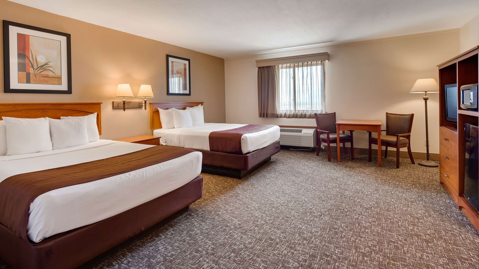 Blackout drapes, iron/ironing board, free cribs/infant beds