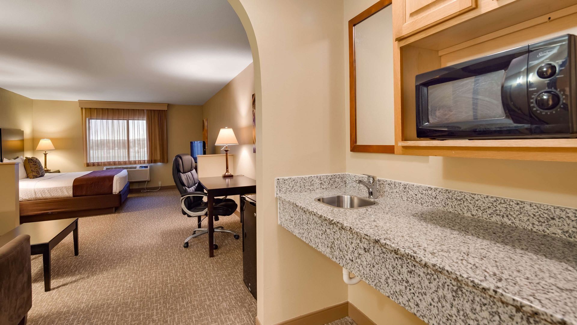 Blackout drapes, iron/ironing board, free cribs/infant beds