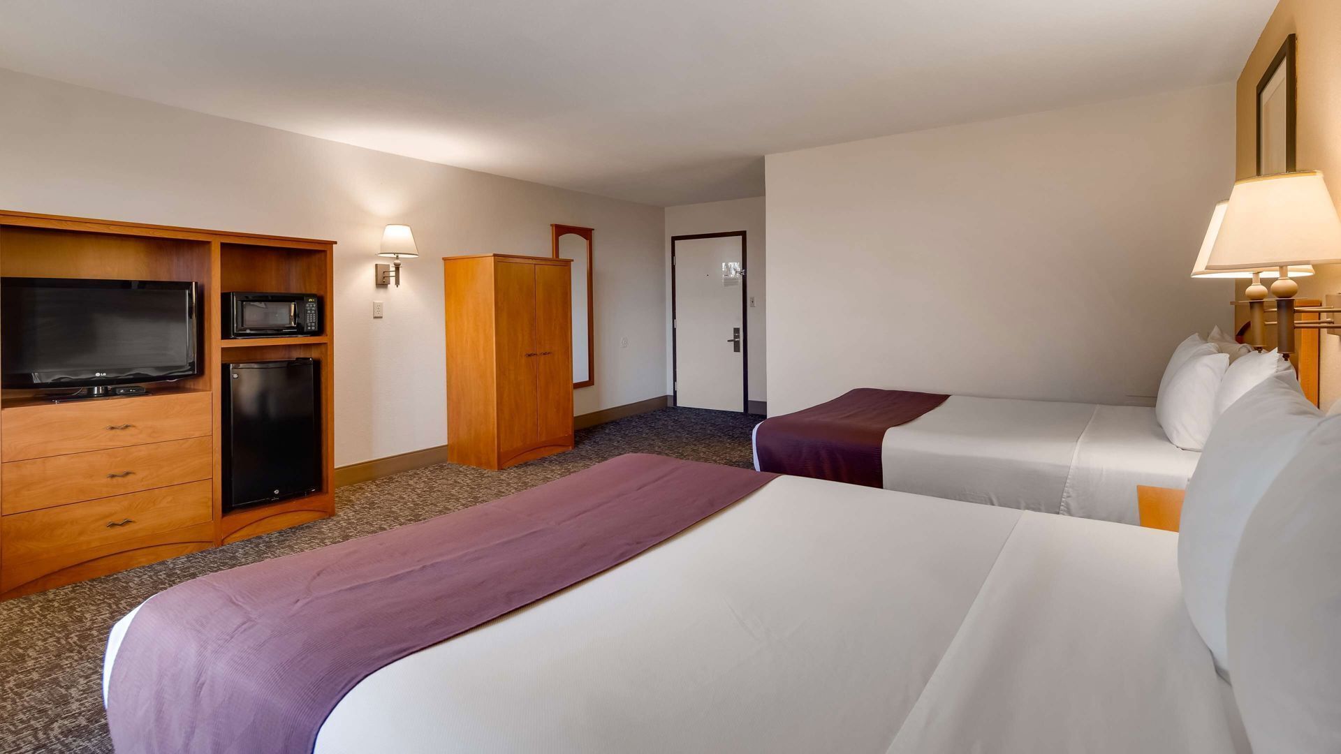 Blackout drapes, iron/ironing board, free cribs/infant beds