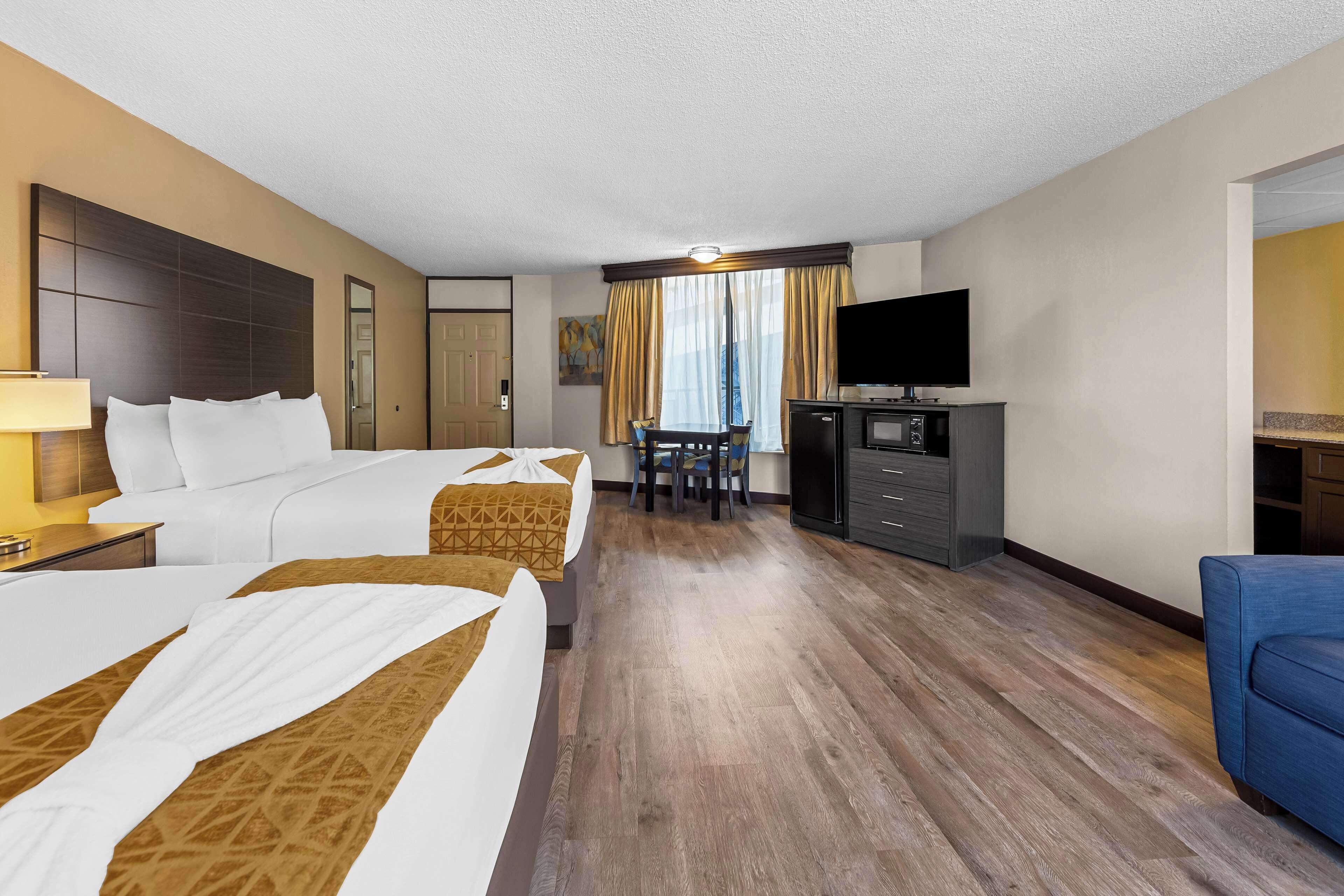 family room, multiple beds, non smoking, refrigerator & microwave | desk, laptop workspace, iron/ironing board, free wifi