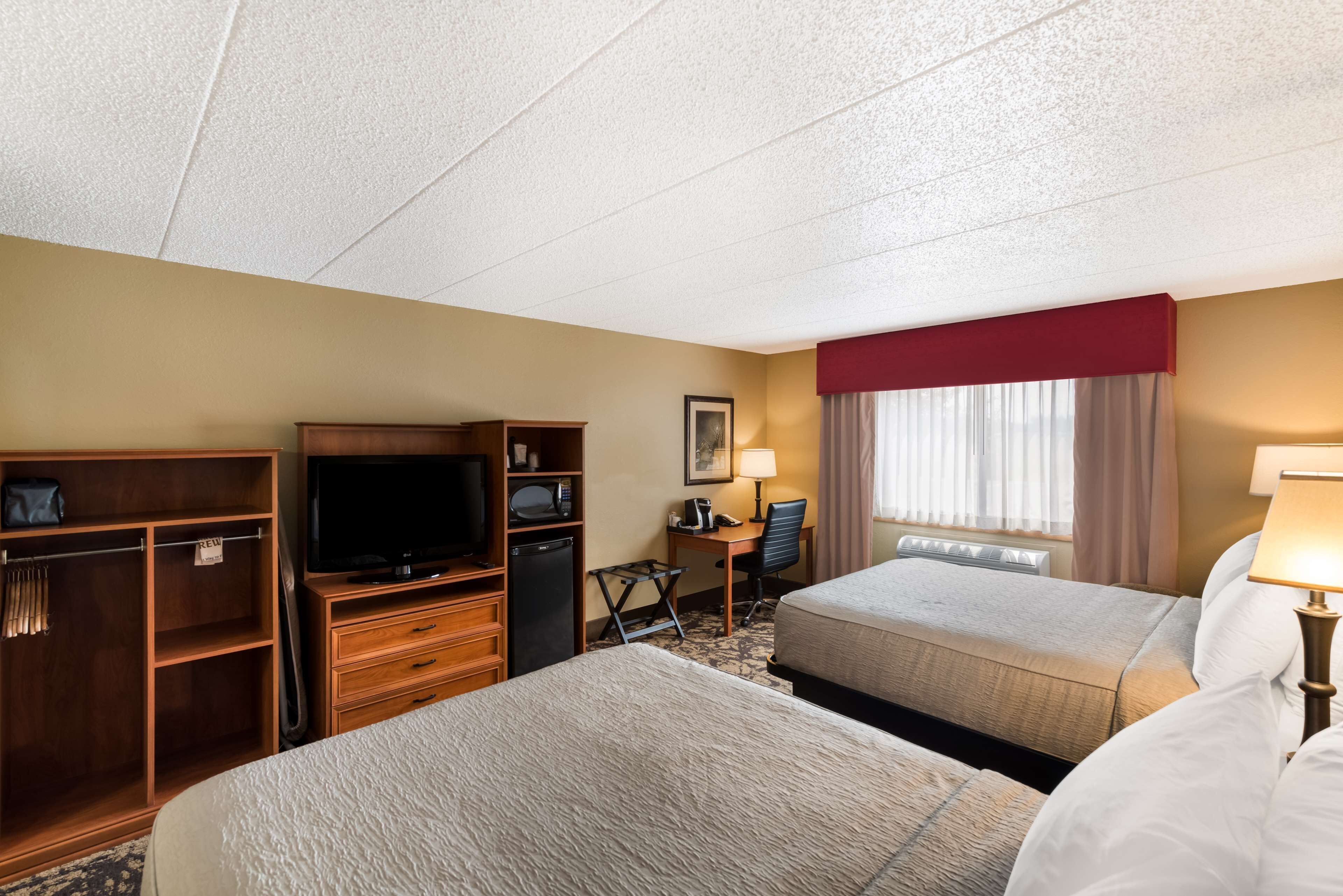 standard room, 2 queen beds, non smoking, refrigerator & microwave | pillow-top beds, desk, laptop workspace, iron/ironing board