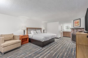 Standard Room, 1 King Bed (Seasonal Fireplace) | Premium bedding, desk, blackout drapes, iron/ironing board - Crossroads Inn & Suites (Gatlinburg)