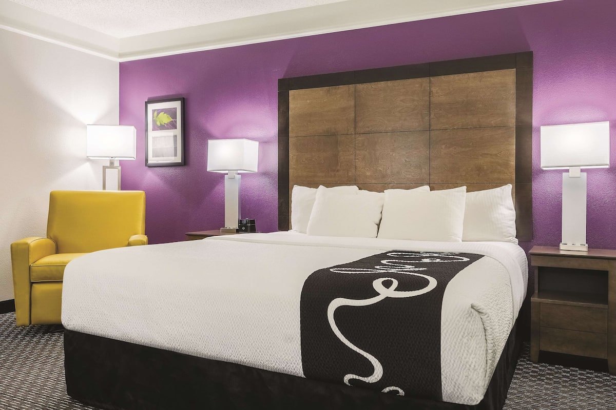 premium bedding, desk, blackout curtains, iron/ironing board
