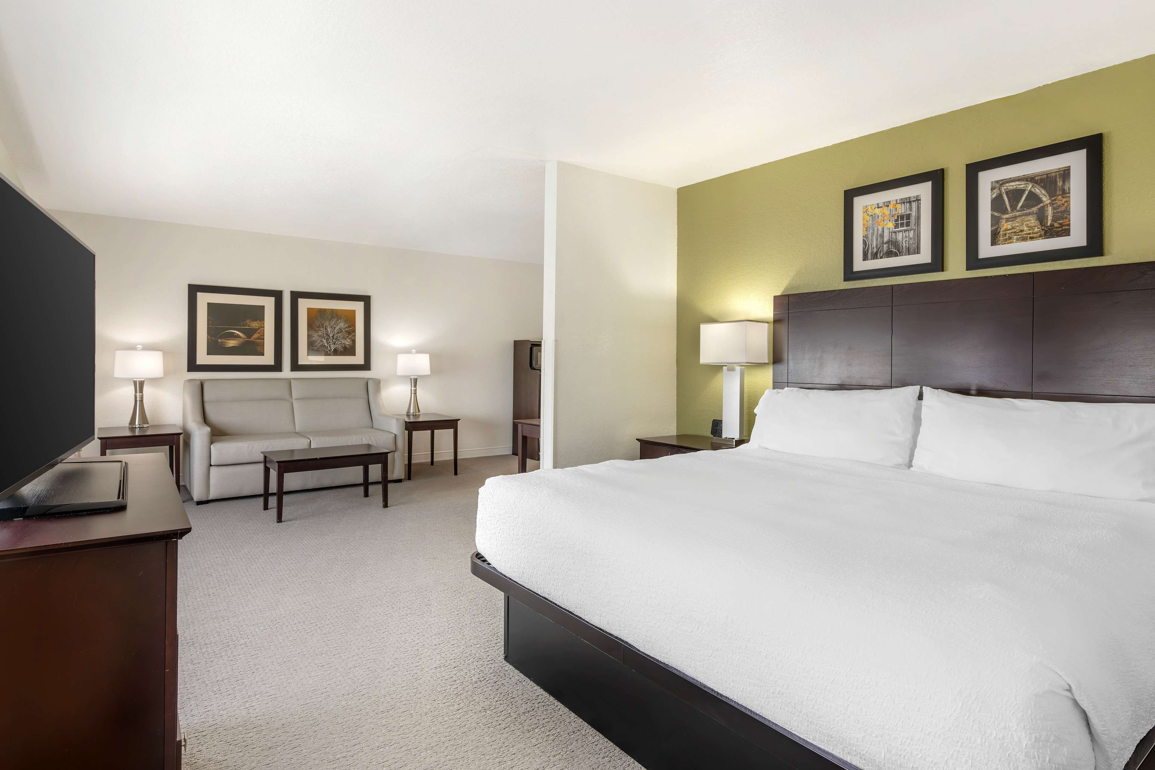 premium bedding, desk, laptop workspace, blackout curtains