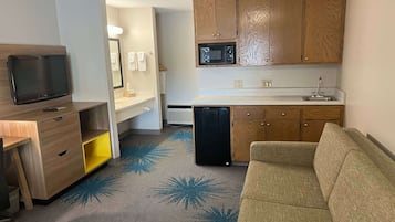 Desk, blackout curtains, free cots/infant beds, rollaway beds