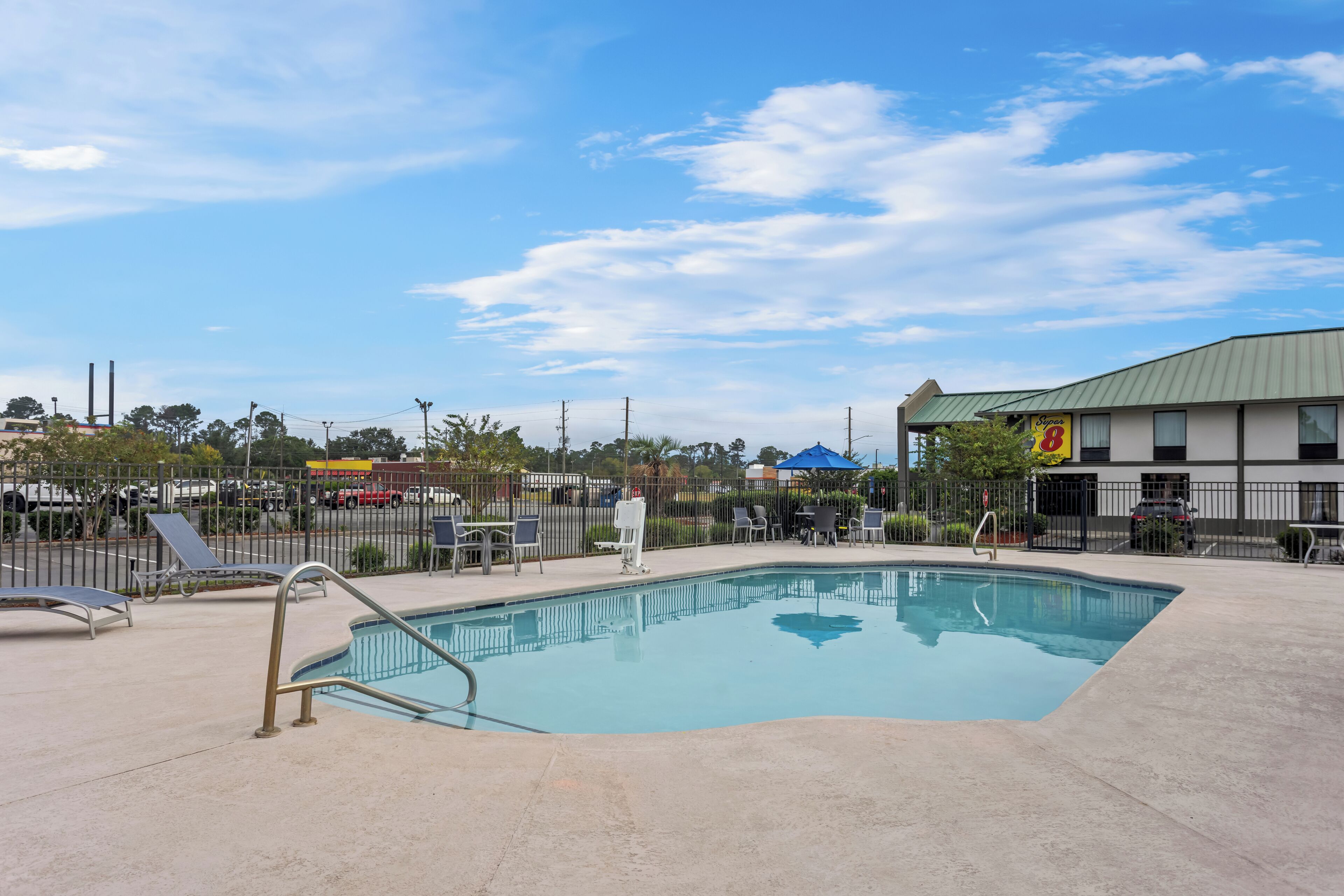 Outdoor pool, open 8:00 AM to 10:00 PM, pool umbrellas, pool loungers