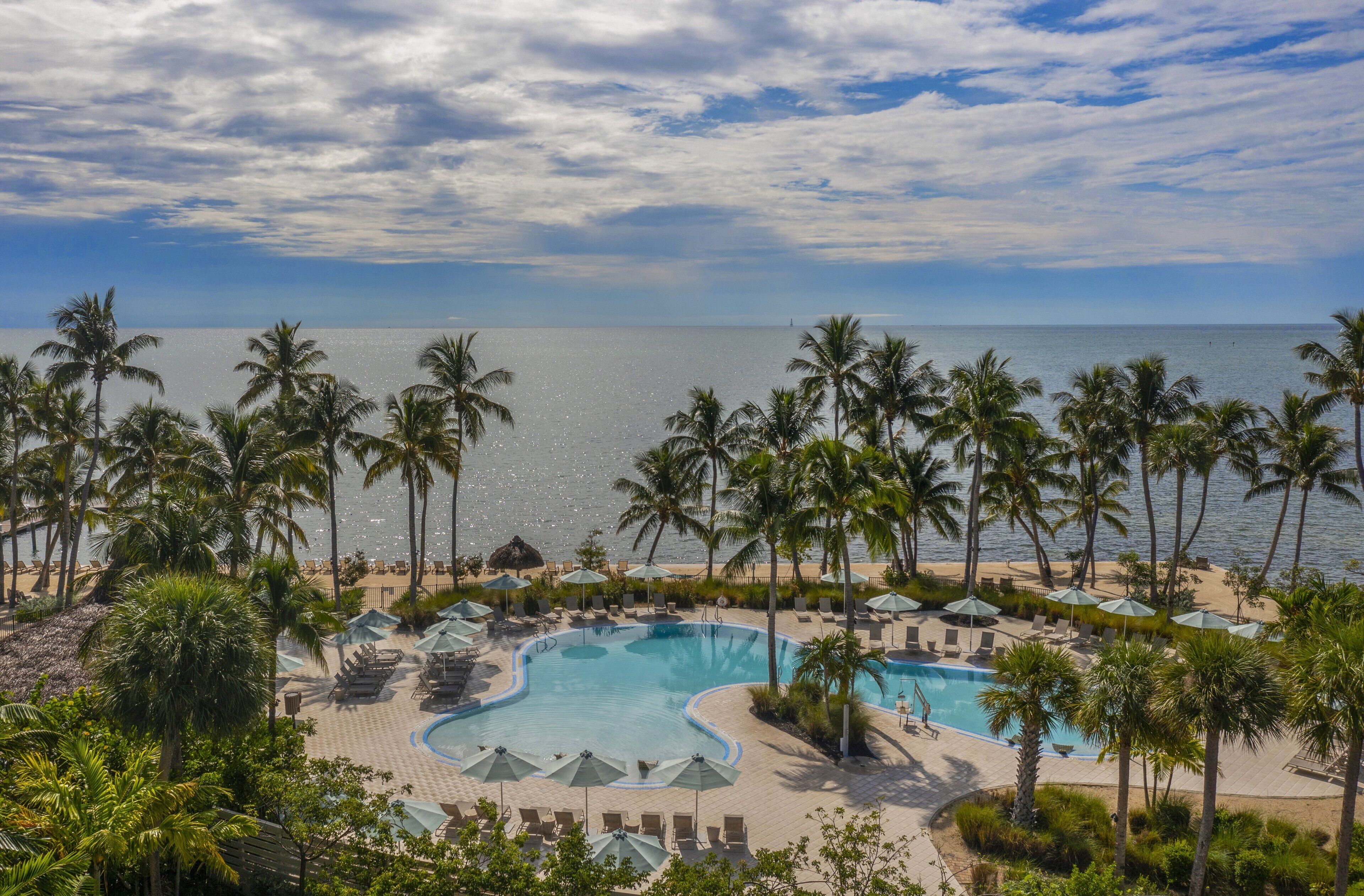 outdoor pool, pool umbrellas, pool loungers
