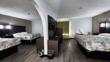 Premium bedding, desk, laptop workspace, free WiFi