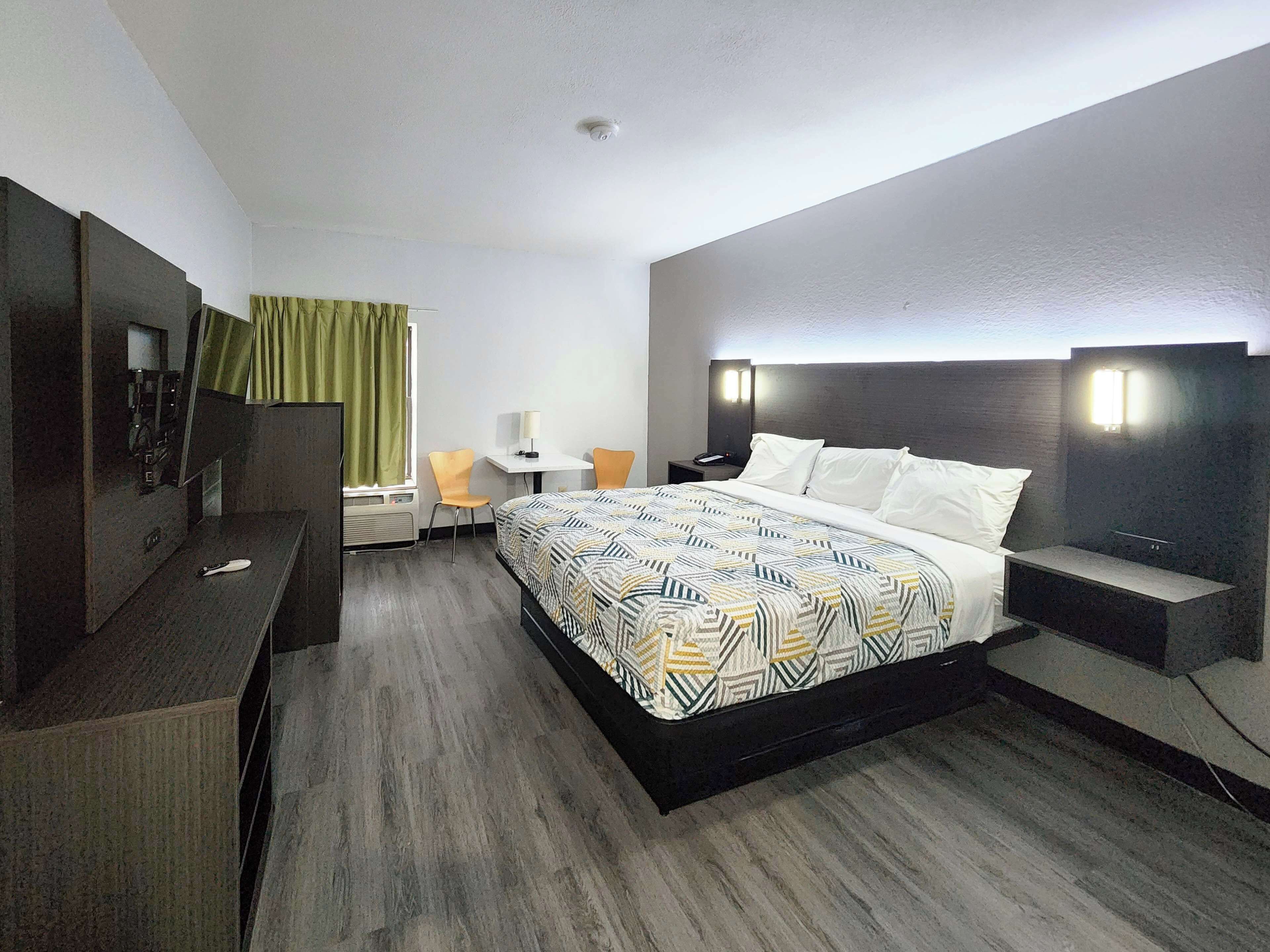 Premium bedding, desk, laptop workspace, free WiFi