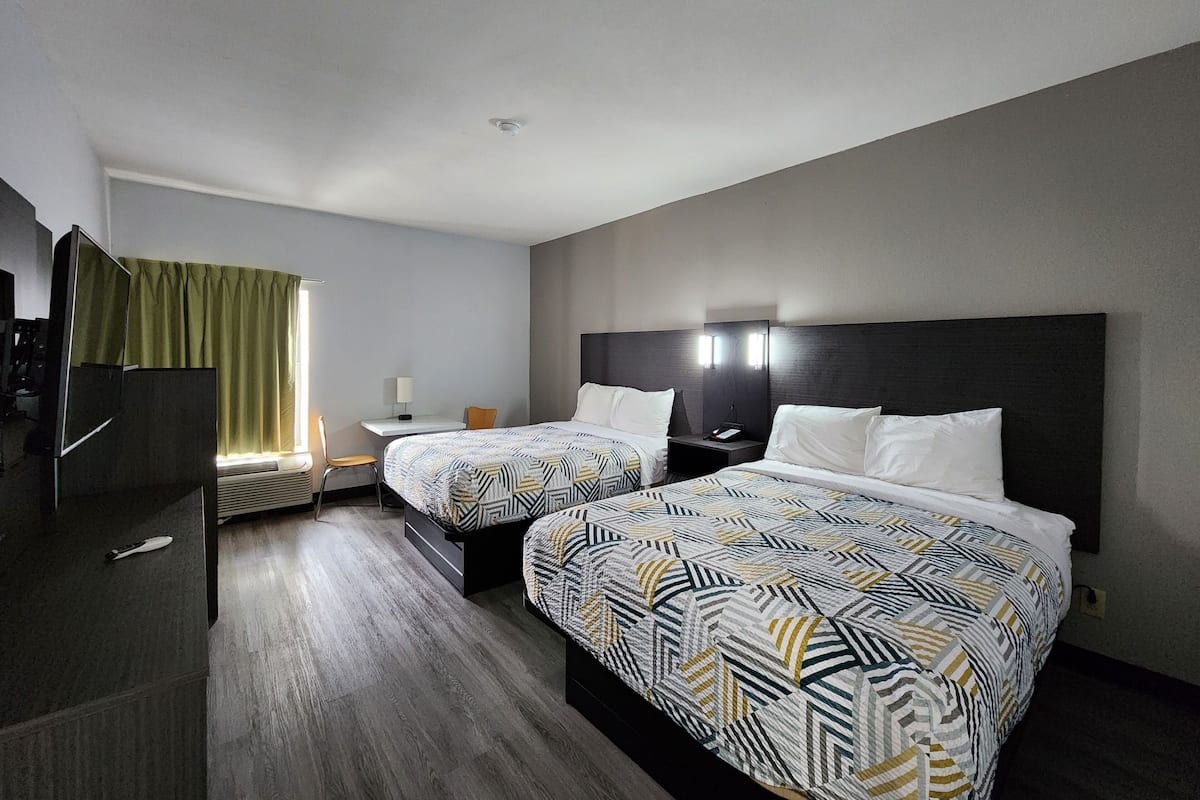 Premium bedding, desk, laptop workspace, free WiFi