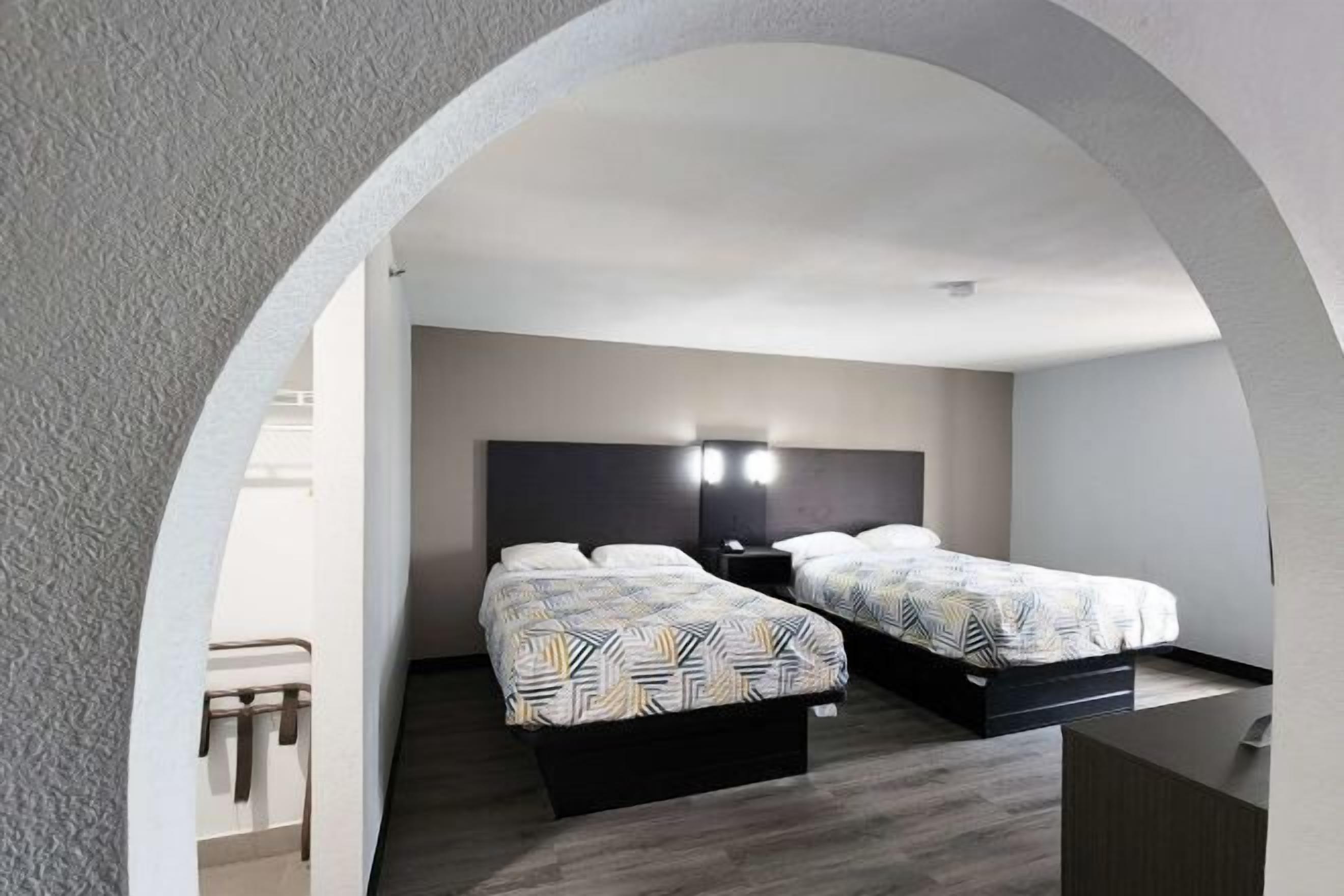 Premium bedding, desk, laptop workspace, free WiFi