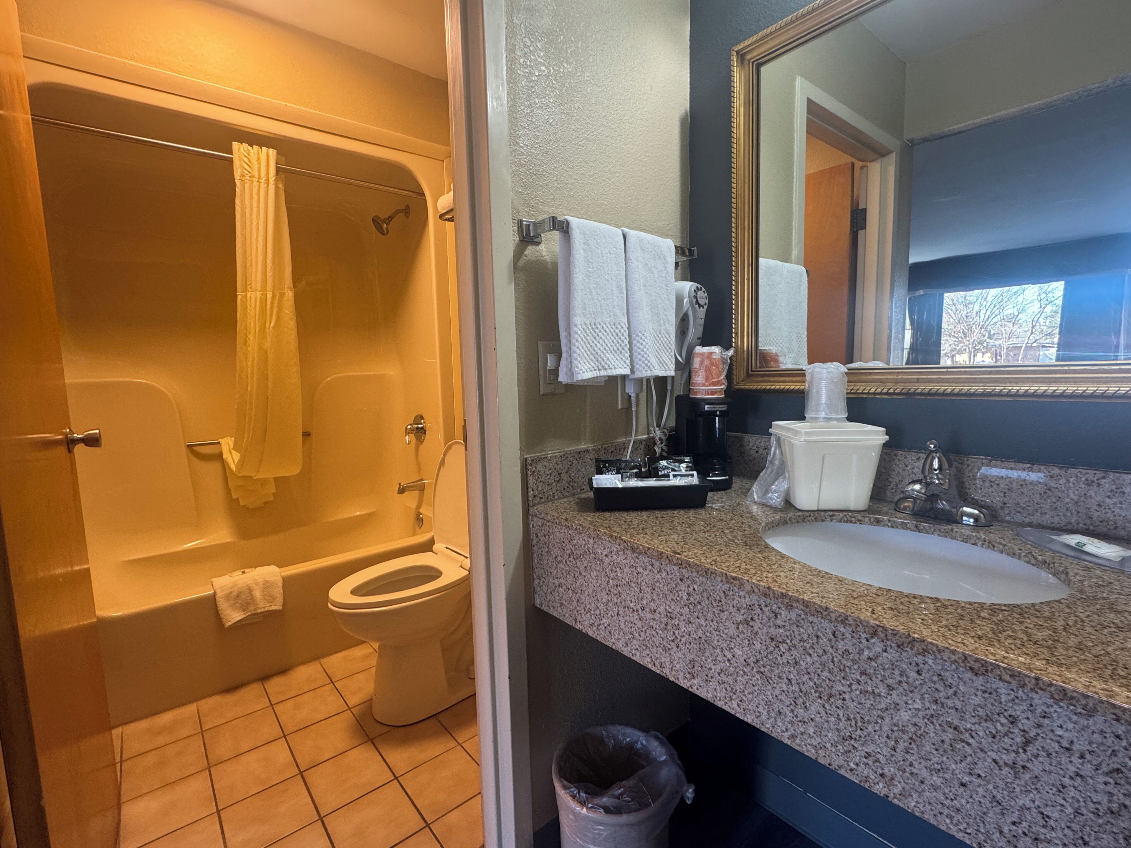 Combined shower/bathtub, hair dryer, towels, soap