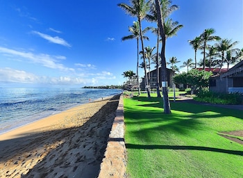 Surfing/boogie boarding at Aston at Papakea Resort