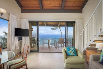 In-room safe, individually decorated, iron/ironing board at Aston at Papakea Resort