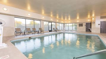 Indoor pool, open 6 AM to 11 PM, pool loungers