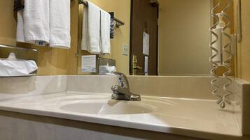 Room, 1 King Bed, Accessible | Bathroom | Combined shower/tub, deep soaking tub, hair dryer, towels