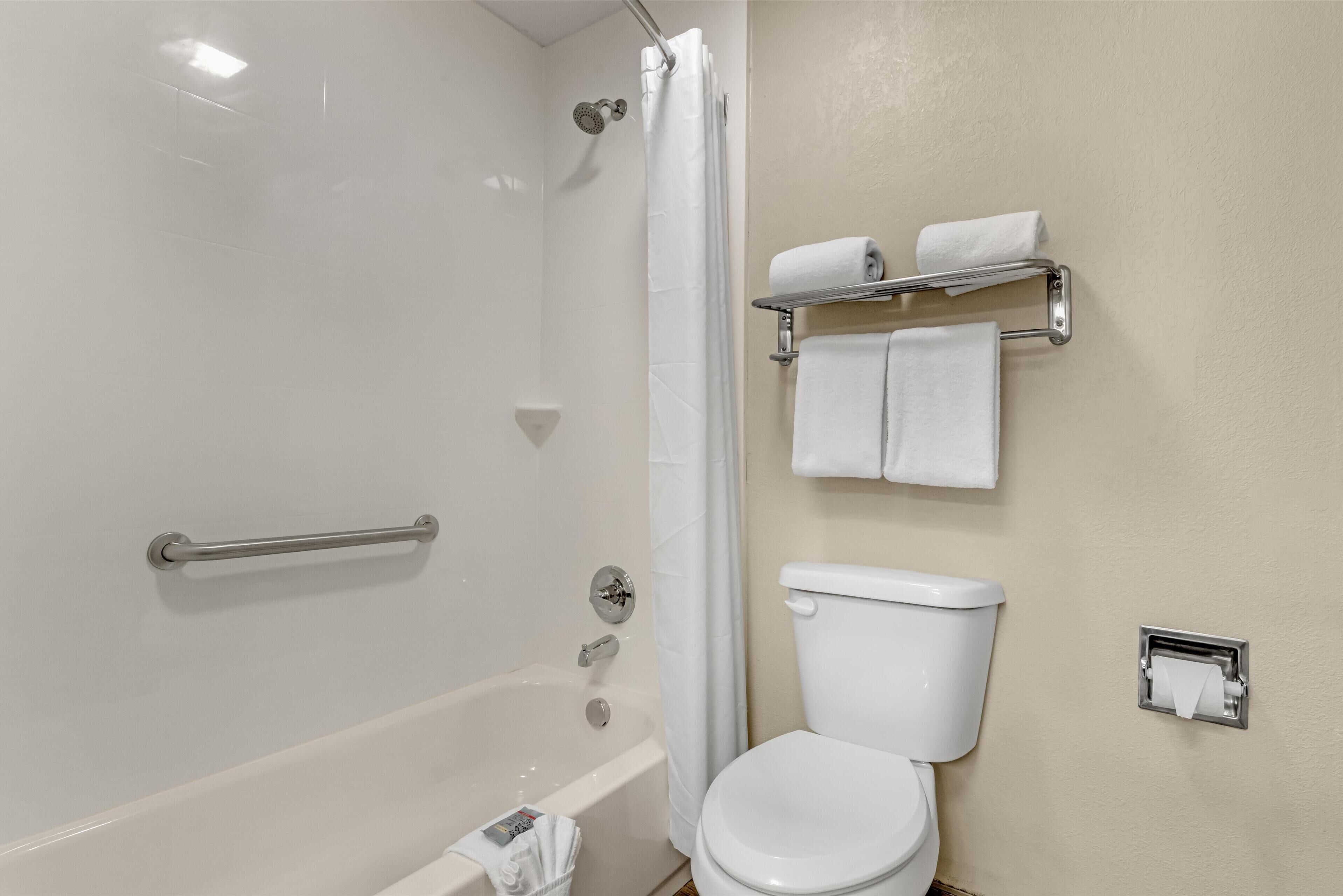 standard room, 2 queen beds, non smoking, refrigerator & microwave | bathroom | free toiletries, hair dryer, towels