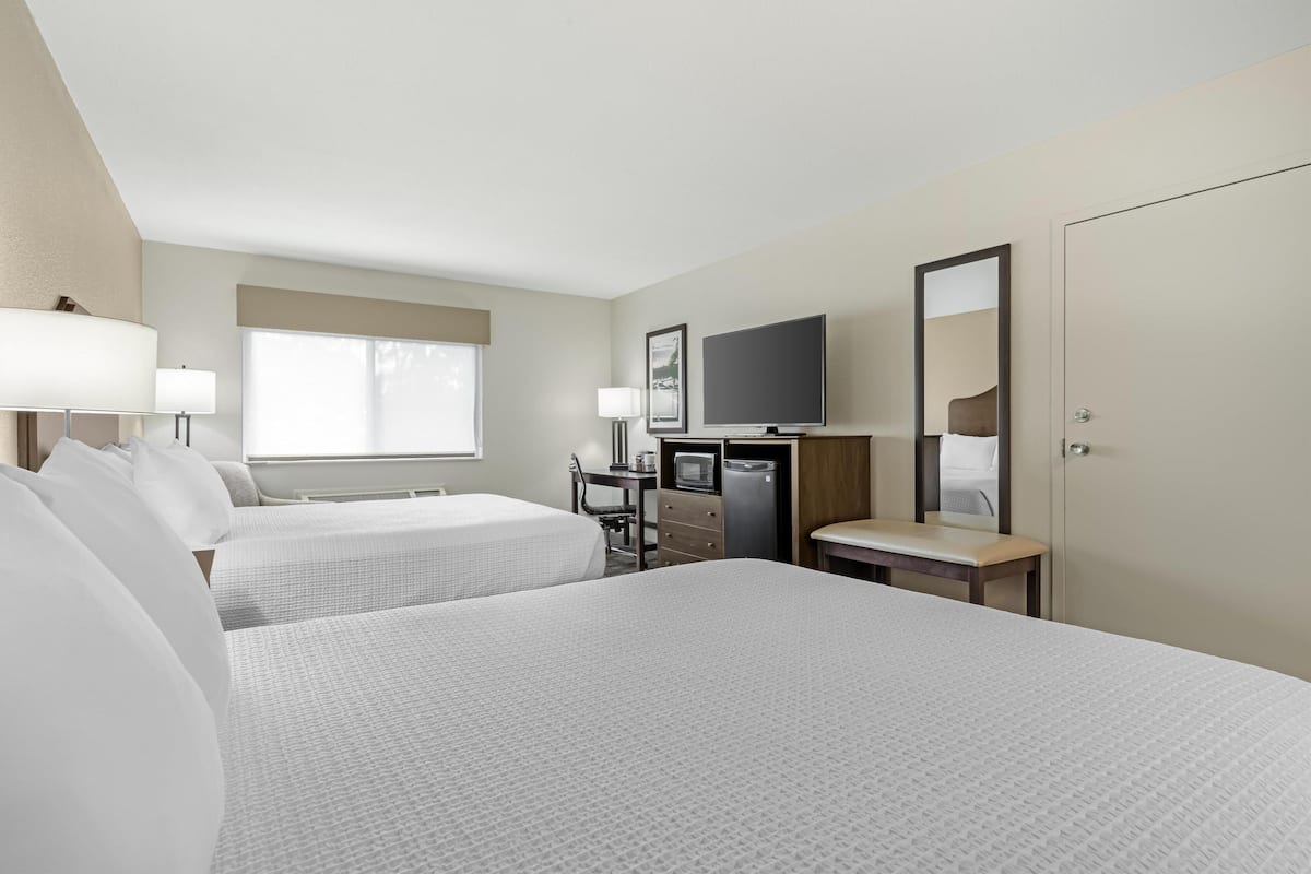 standard room, 2 queen beds, non smoking, refrigerator & microwave | desk, soundproofing, iron/ironing board, rollaway beds