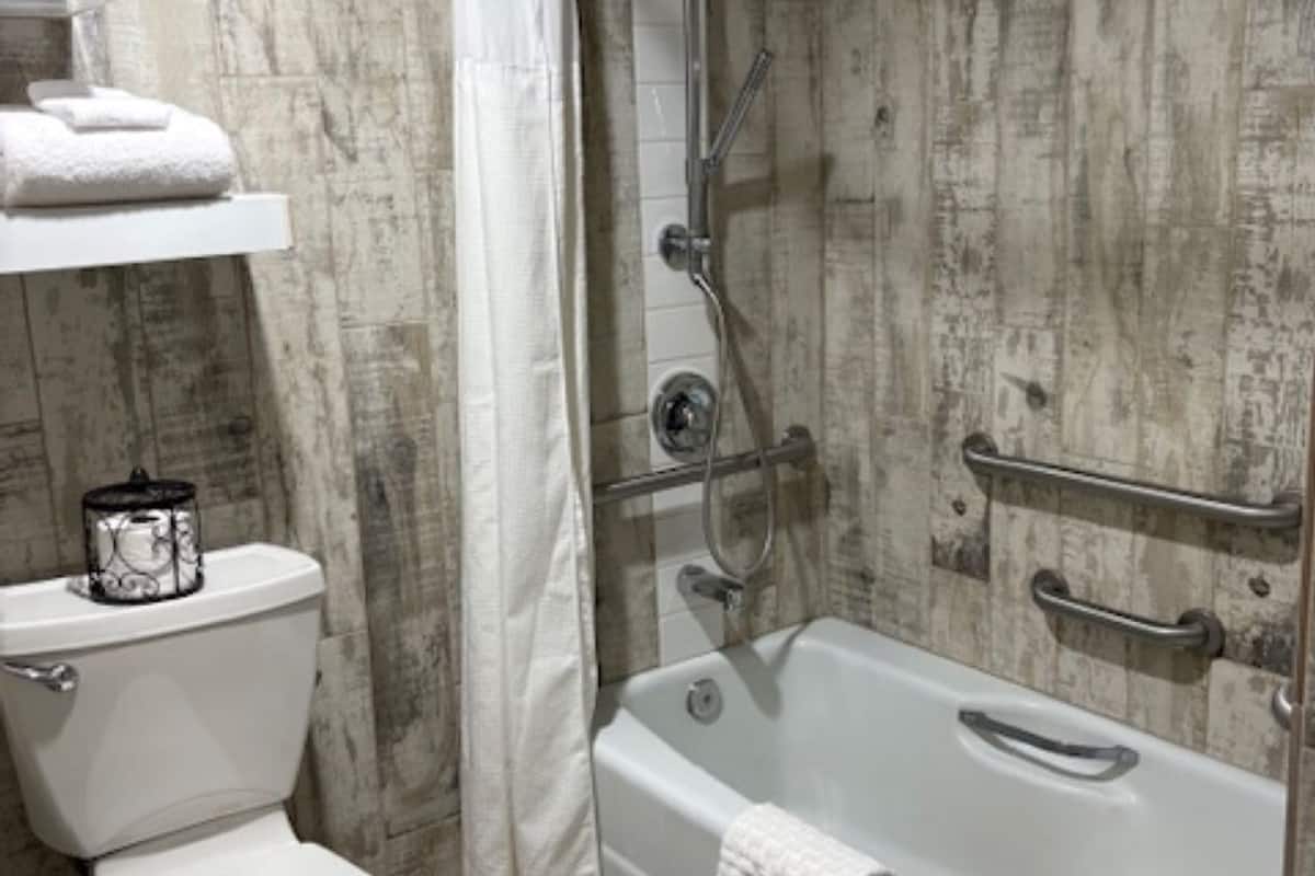 standard room, 2 queen beds, accessible, refrigerator & microwave | bathroom | combined shower/bathtub, rainfall showerhead, free toiletries