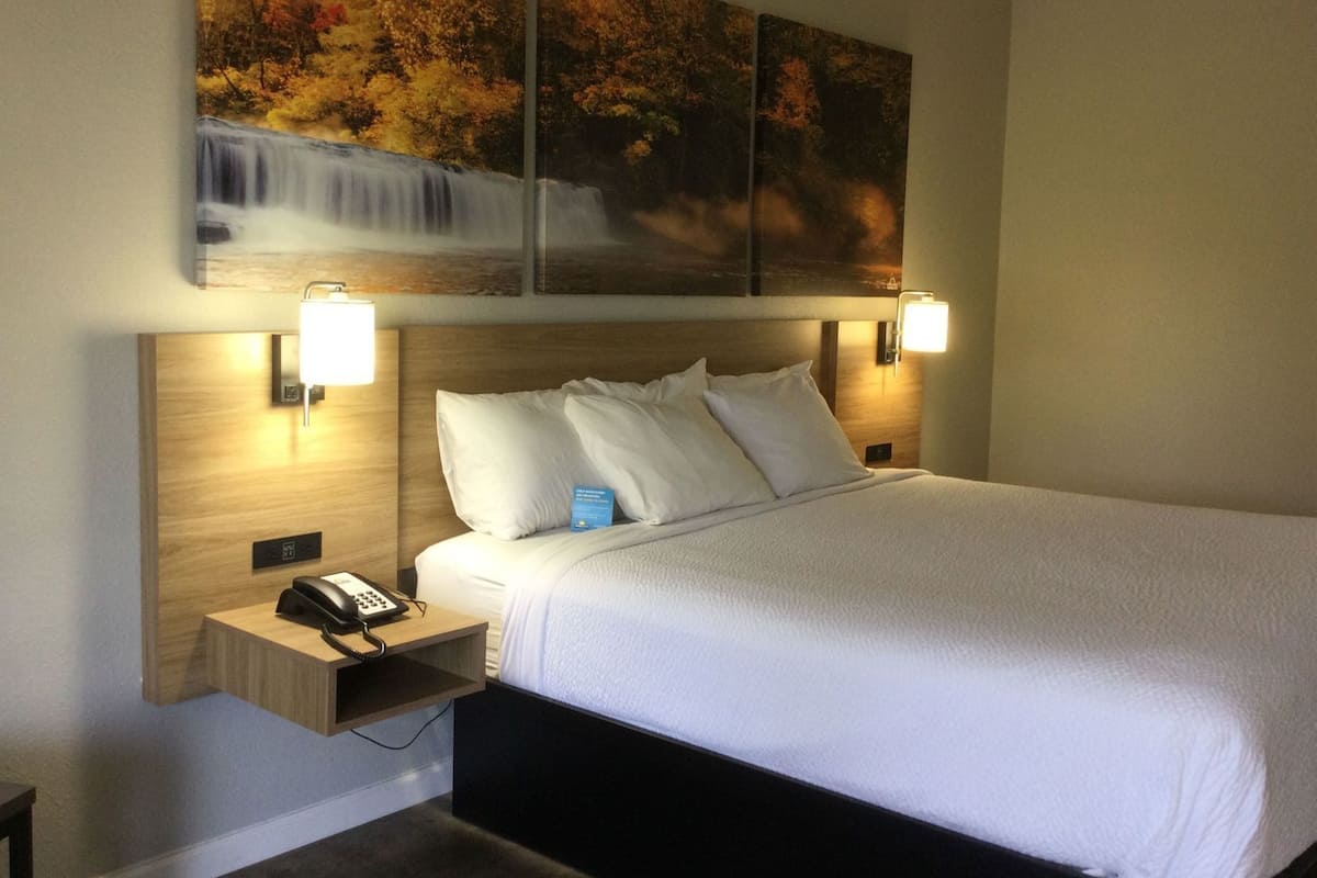 Cortinas blackout, tabla de planchar con plancha, camas extra y wifi