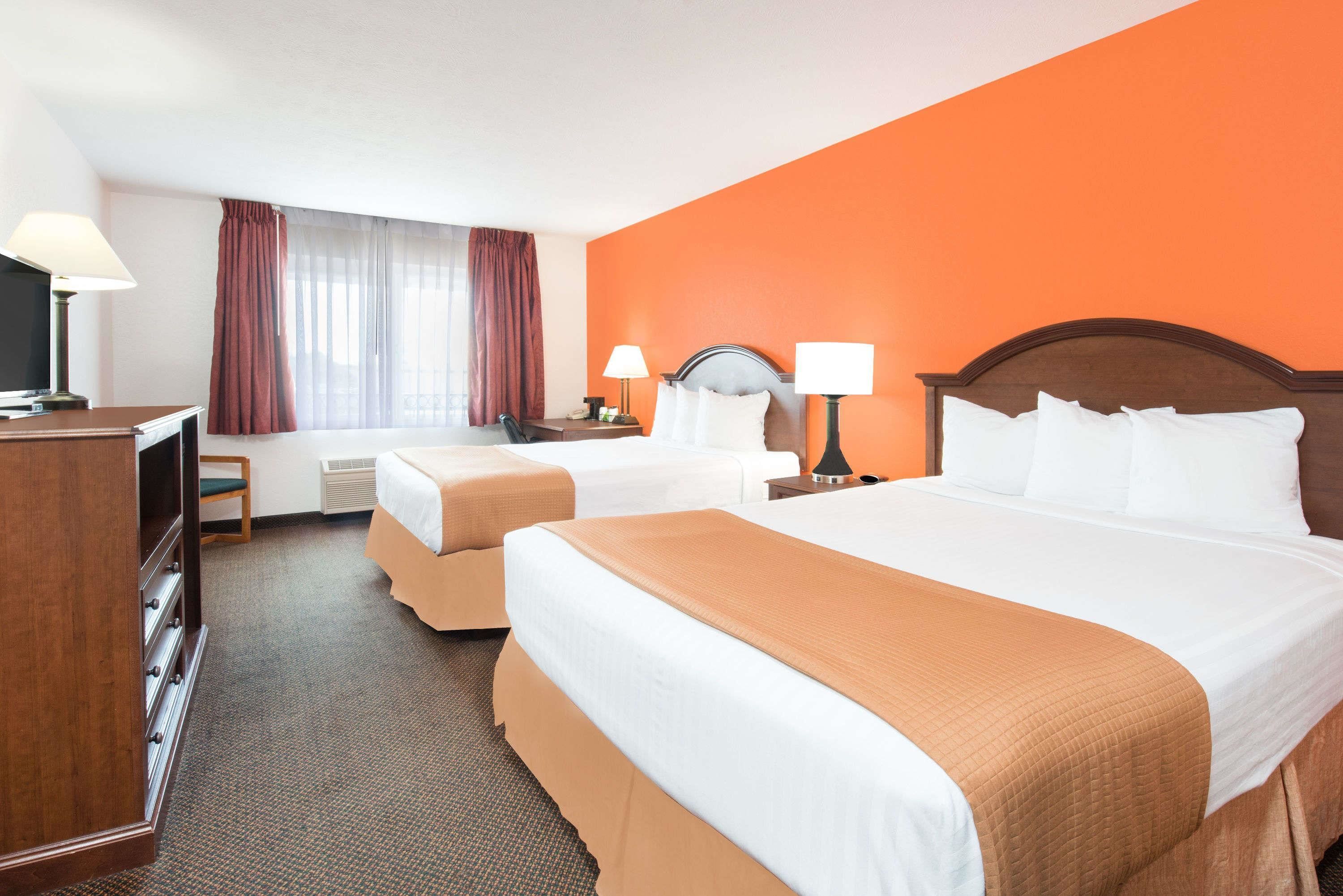 standard room, 2 queen beds | desk, iron/ironing board, free cots/infant beds, free wifi