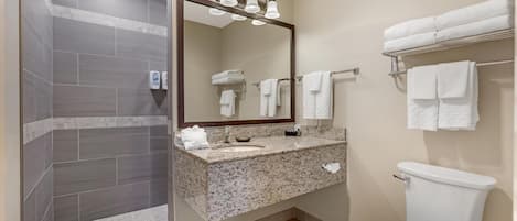 Suite, 1 King Bed, Non Smoking, Kitchen (Living Room) | Bathroom | Free toiletries, hair dryer, towels