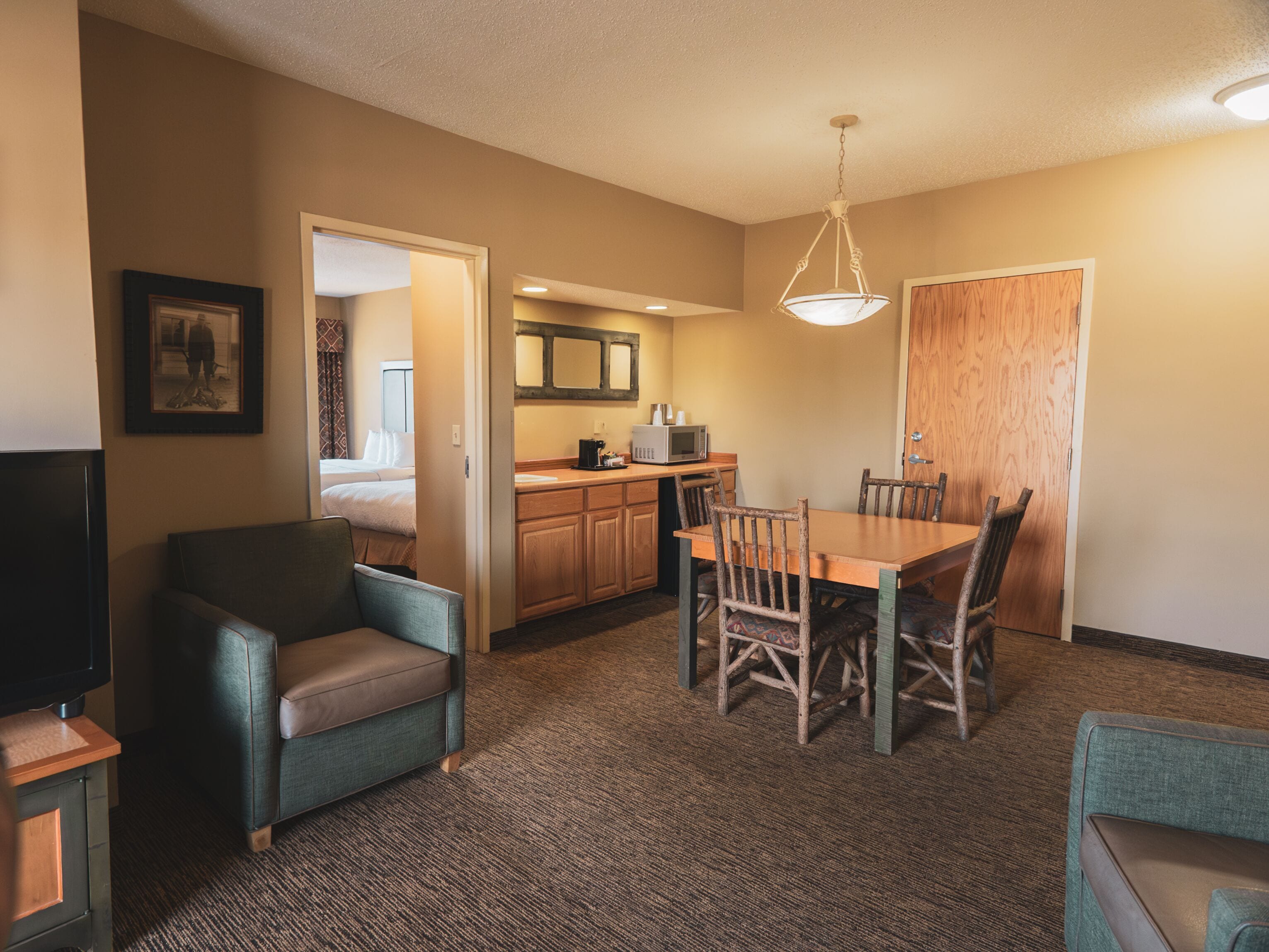 double queen corner suite | living area | flat-screen tv, dvd player