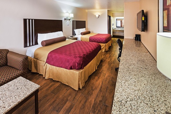 Premium bedding, pillowtop beds, desk, blackout drapes