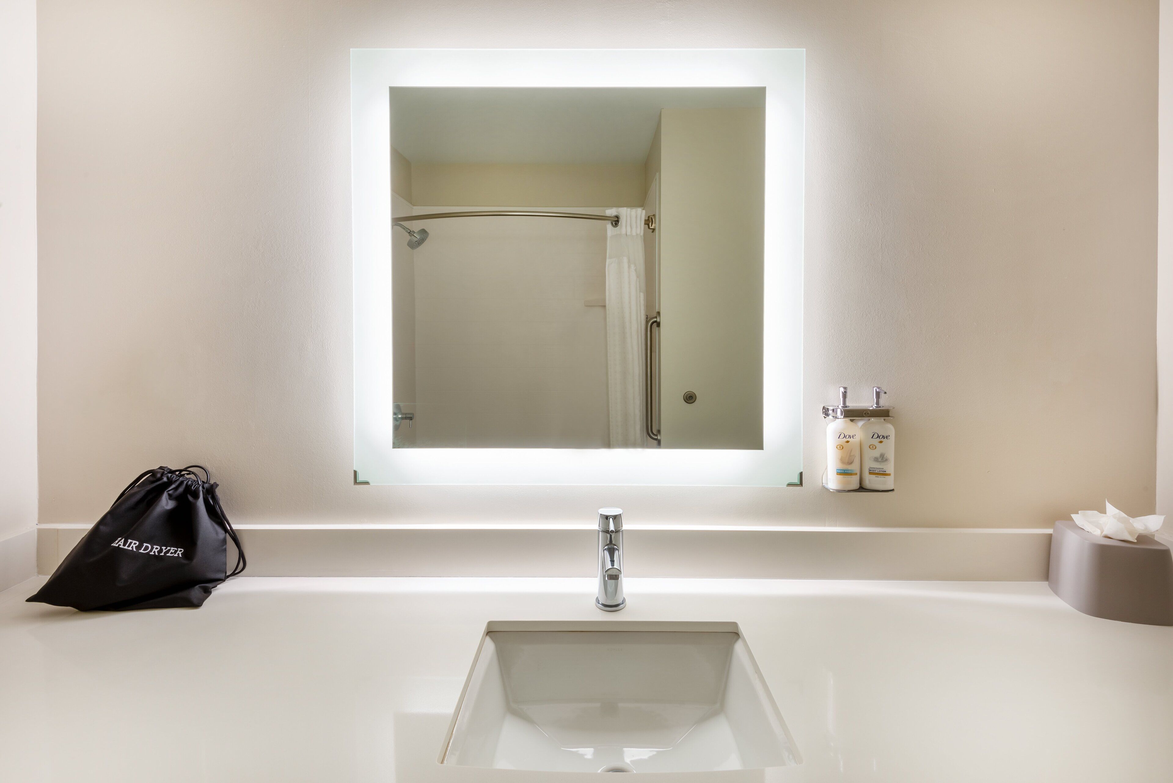 hair dryer, towels, soap, shampoo