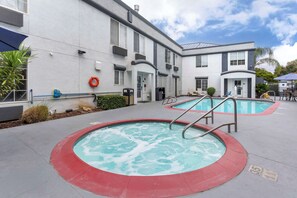 Outdoor pool, pool umbrellas, pool loungers