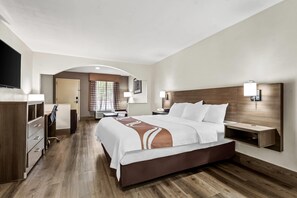 Suite, 1 King Bed, Non Smoking | Premium bedding, desk, blackout curtains, iron/ironing board - Quality Inn & Suites near Robins Air Force Base (Warner Robins)