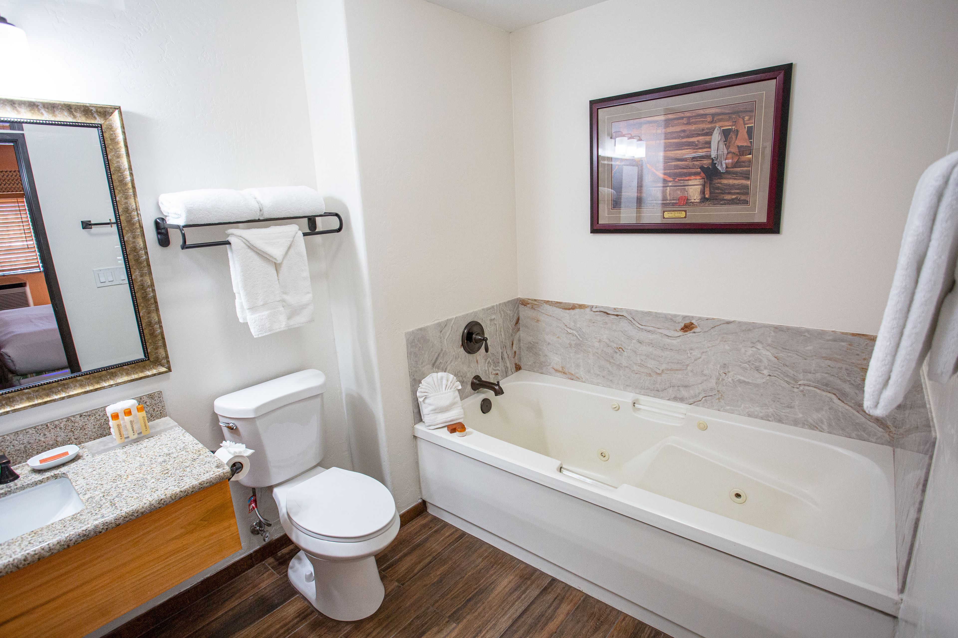 jetted bliss king retreat | bathroom | eco-friendly toiletries, hair dryer, bathrobes, towels