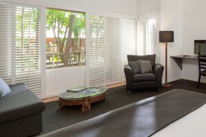 Superior Room, 1 King Bed | Living area | LCD TV, streaming services