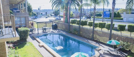Outdoor pool, pool umbrellas, sun loungers