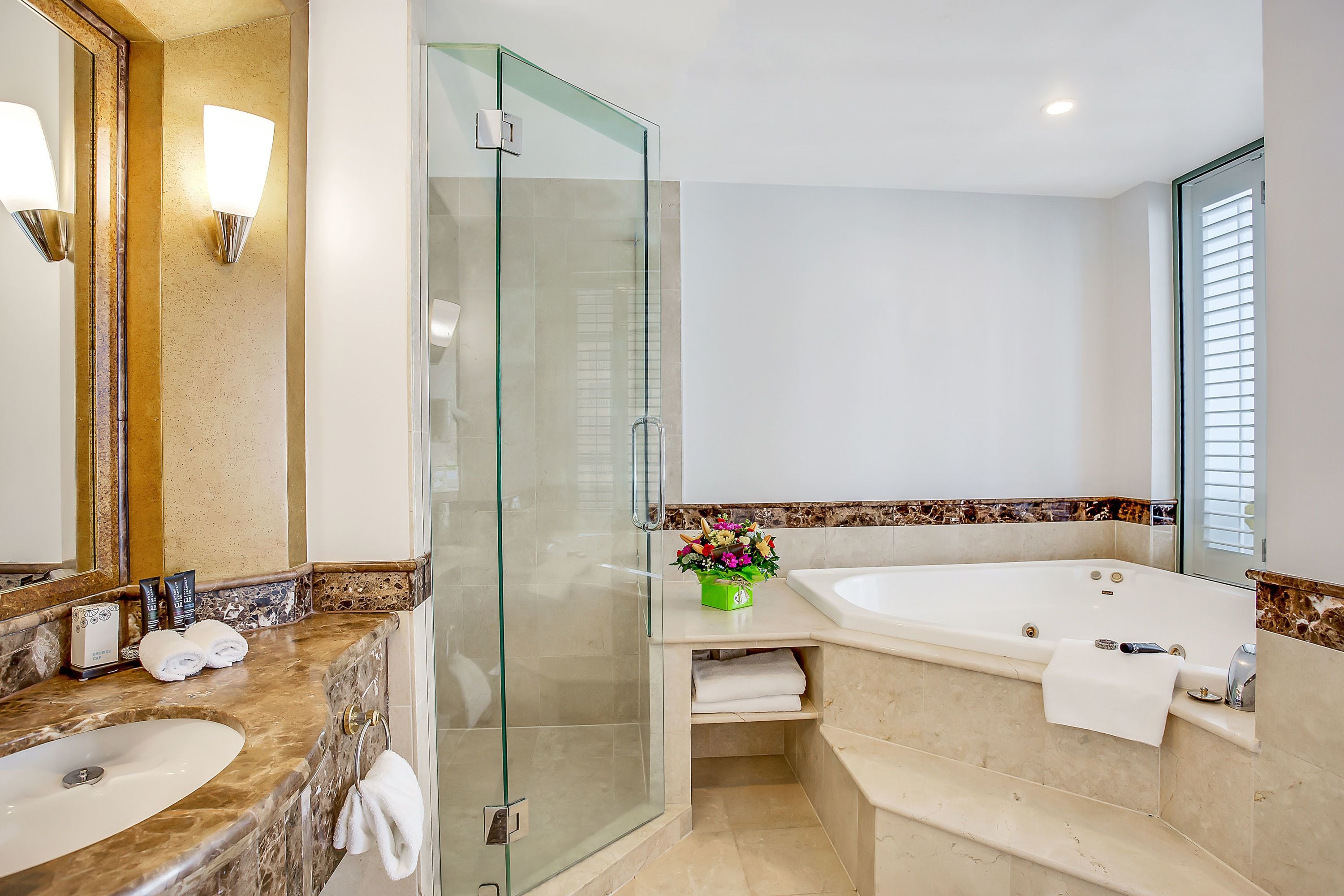 spa suite | bathroom | combined shower/bathtub, hair dryer, towels