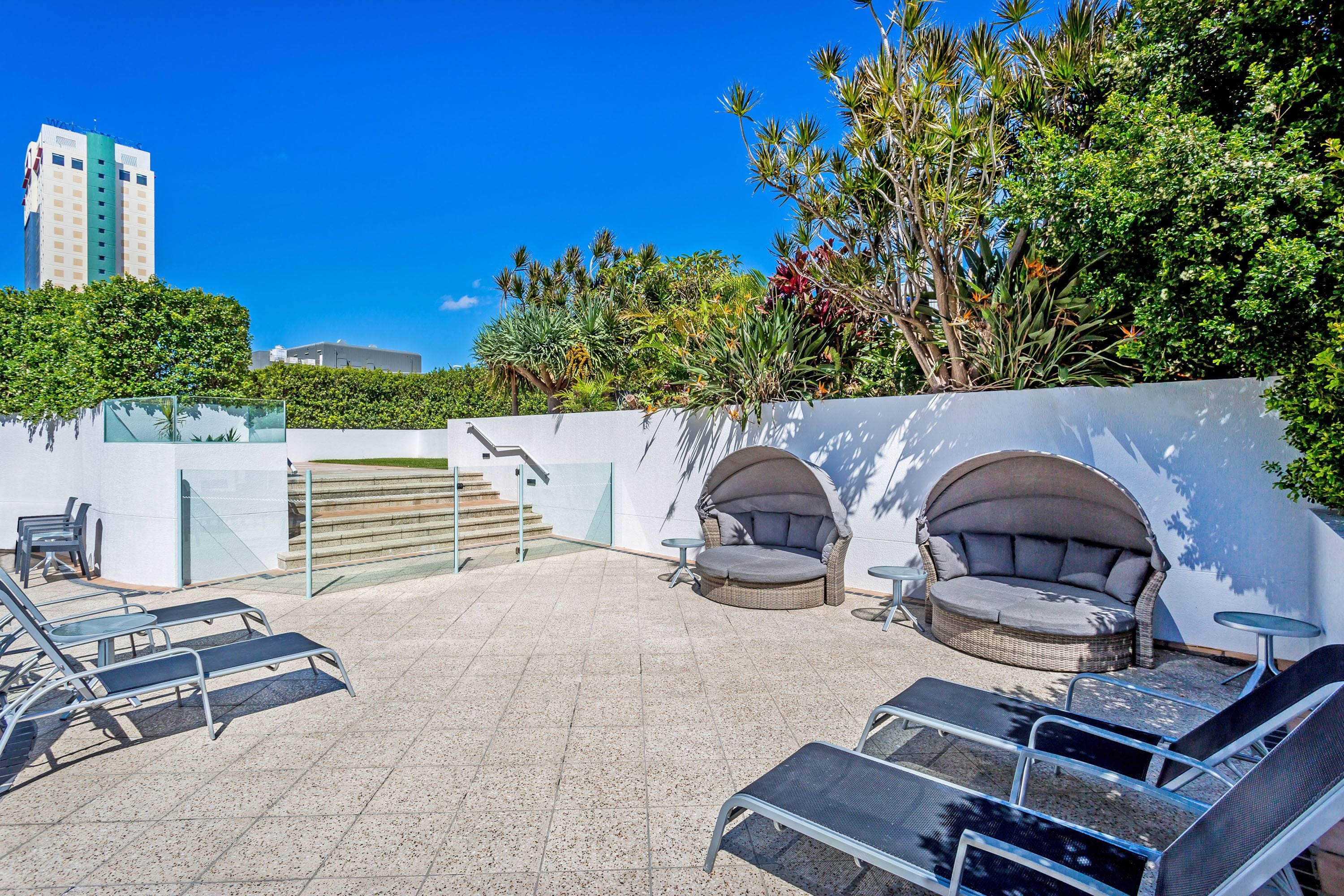 outdoor pool, pool loungers