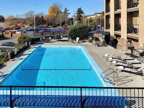 Outdoor pool, open 9 AM to 9:00 PM, pool umbrellas, sun loungers