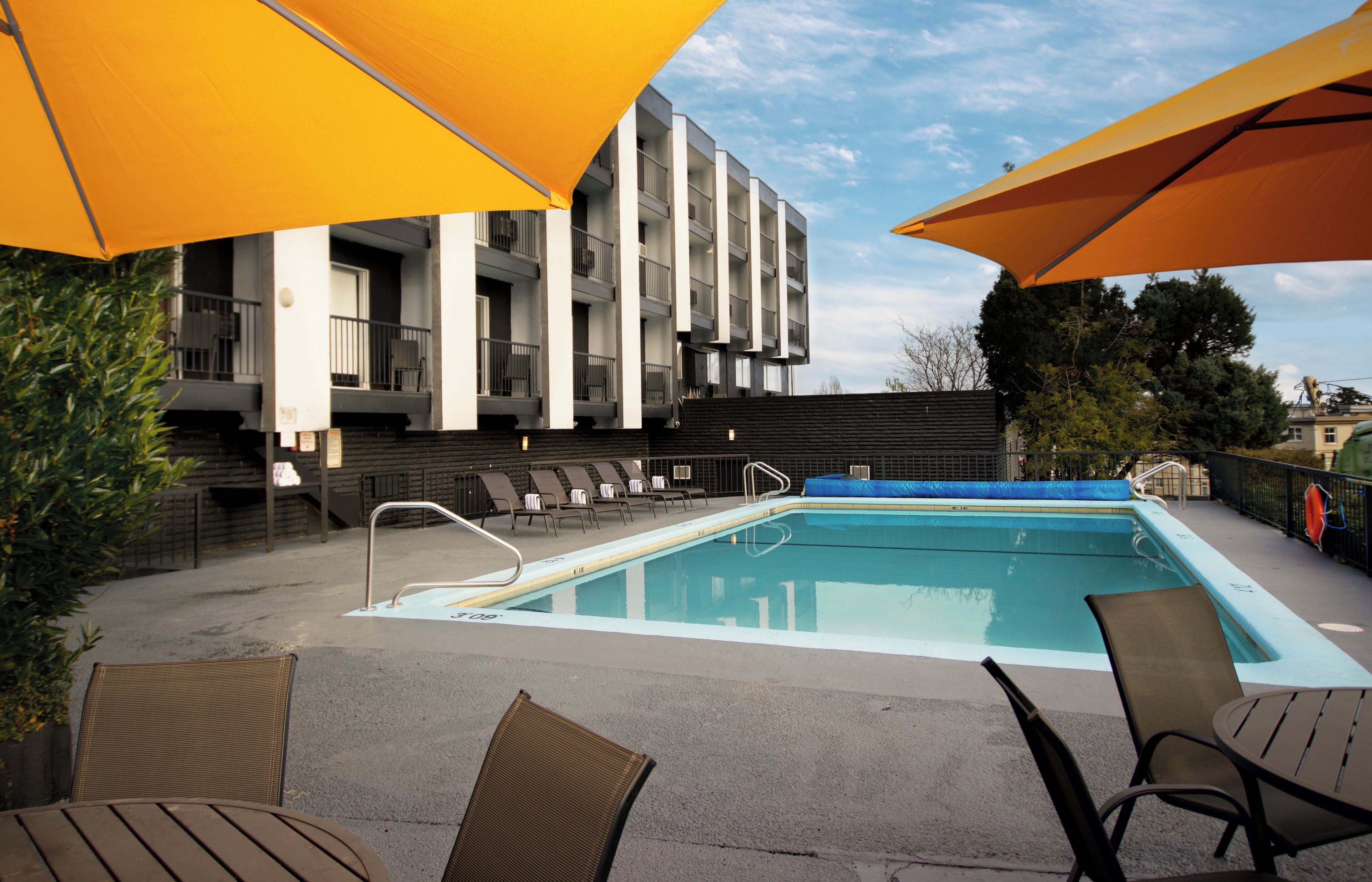 Outdoor pool, open 9 AM to 9:00 PM, pool umbrellas, sun loungers