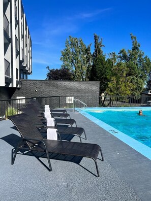 Outdoor pool, open 9 AM to 9:00 PM, pool umbrellas, sun loungers