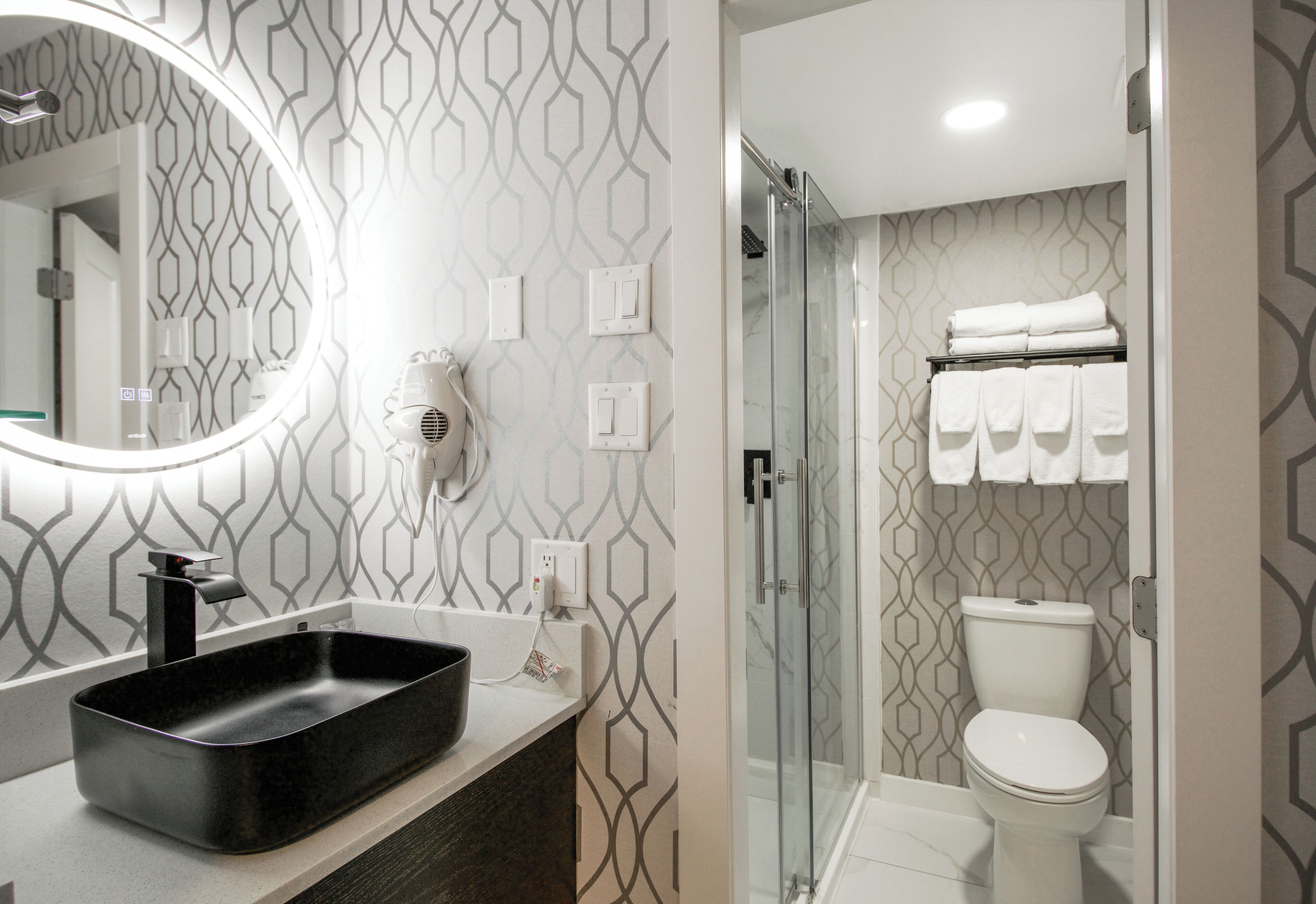 Suite, 2 Queen Beds, Non Smoking | Bathroom | Shower, rainfall showerhead, free toiletries, hair dryer