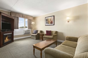Suite, 1 King Bed, Non Smoking (One-Bedroom) | Desk, free cribs/infant beds, rollaway beds, free WiFi
