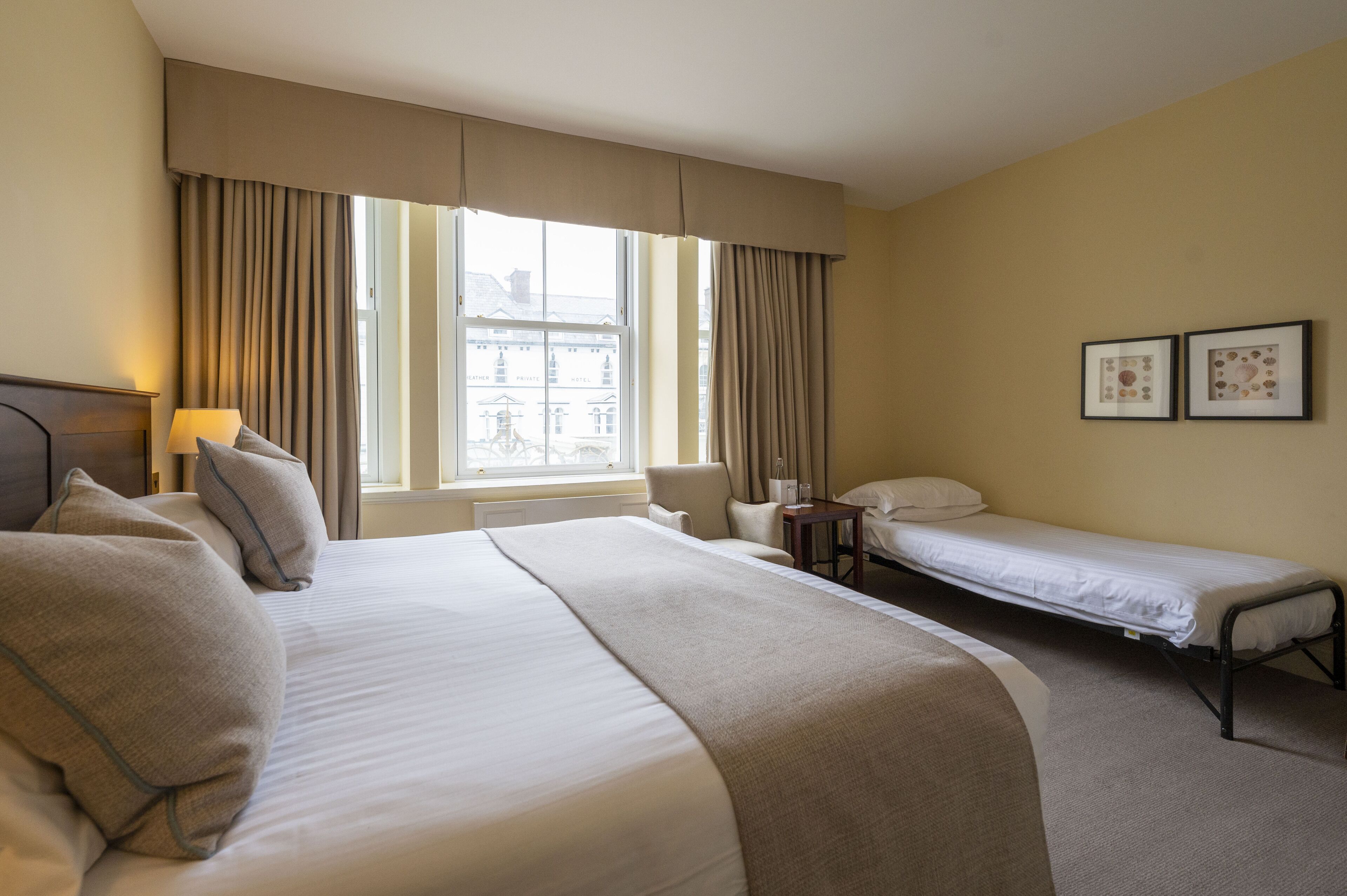 family room, multiple beds, city view | 1 bedroom, premium bedding, individually decorated