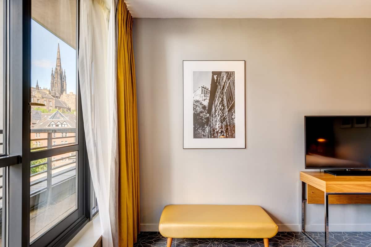 castle view deluxe room with balcony | hypo-allergenic bedding, in-room safe, desk, iron/ironing board