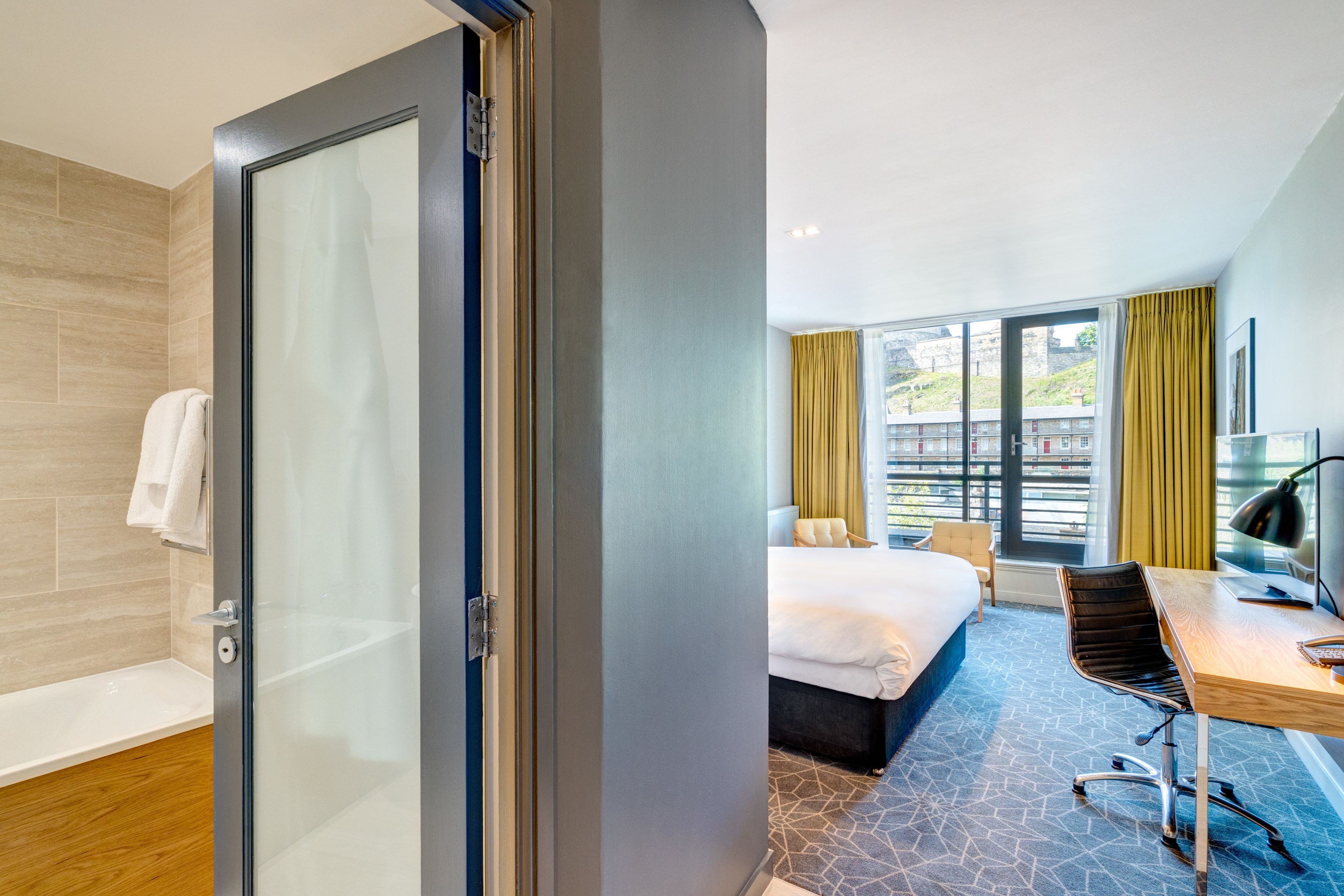 castle view deluxe room with balcony | hypo-allergenic bedding, in-room safe, desk, iron/ironing board