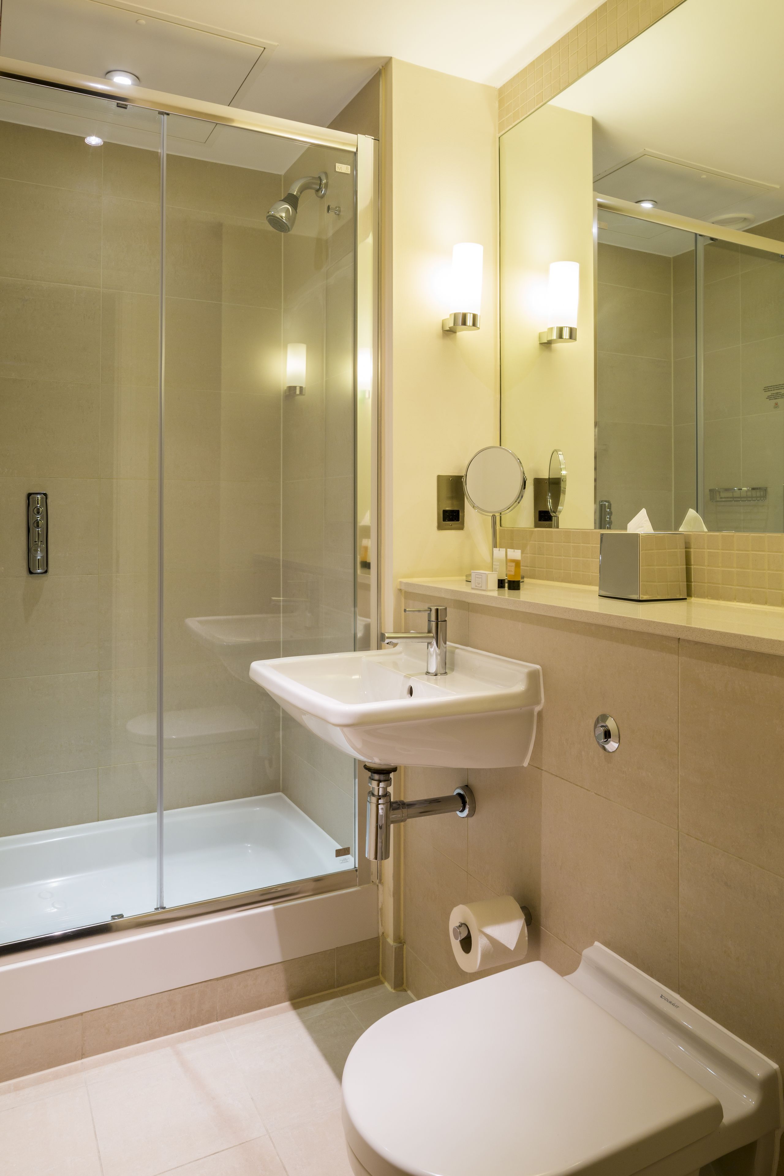 eco-friendly toiletries, hair dryer, towels